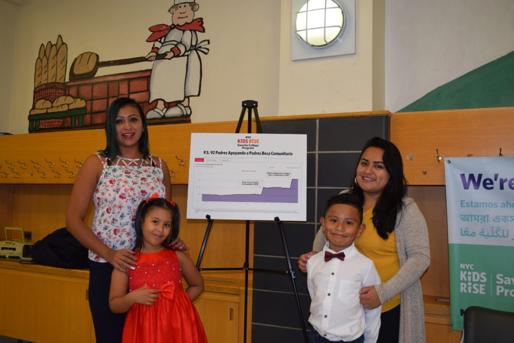  P.S. 92 PTA President Rosa Mar with her daughter and P.S. 92 Parent Maribel Aparicio with her son during the Parent-to-Parent Community Scholarship Announcement